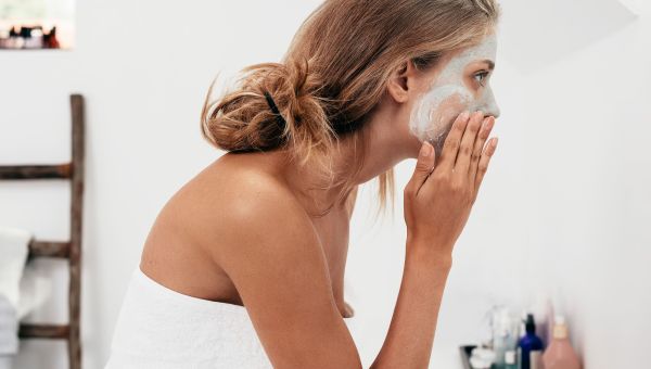 putting on face mask