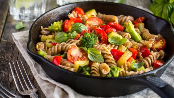 skillet with whole wheat pasta and grilled vegetables