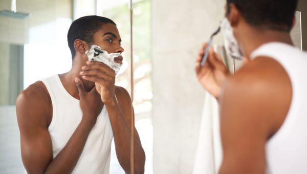 man shaving face