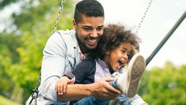 Man holding his daughter