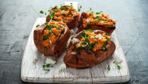 Sweet potatoes on white pan
