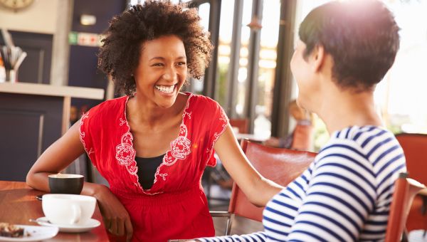 women talking at a restaurant