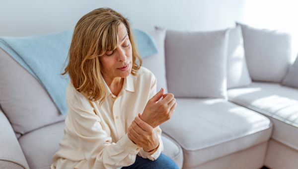 a woman with wrist pain