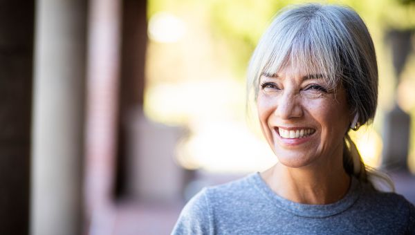 person smiling outside