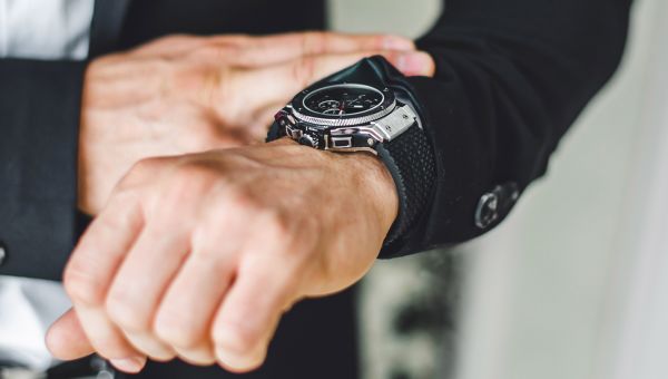 Watch on man's wrist.