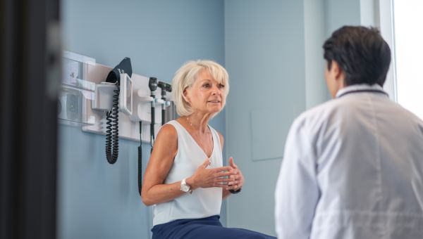 woman consulting with healthcare provider in office