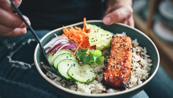 rice and salmon bowl with vegetables