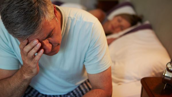 alarm, man unable to go to sleep, waking up early