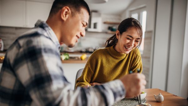 happy couple eating together