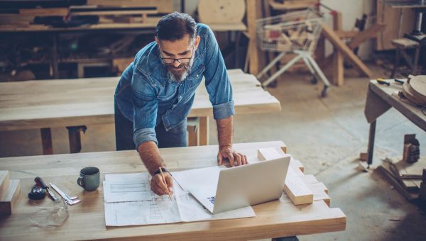 Middle-aged man engaged in a woodworking hobby