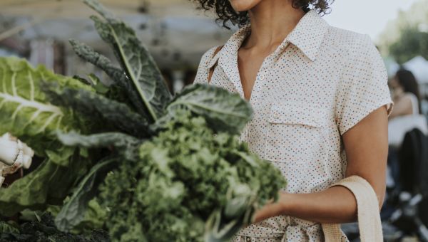 shopping at farmer's market for kale