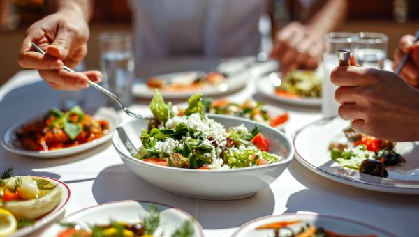 table of healthy plates of food for sharing