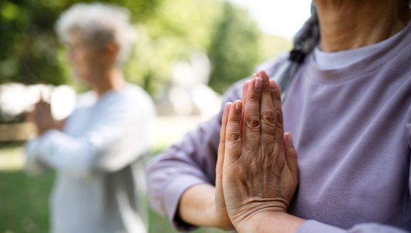 closeup of tai chi hands outdoors