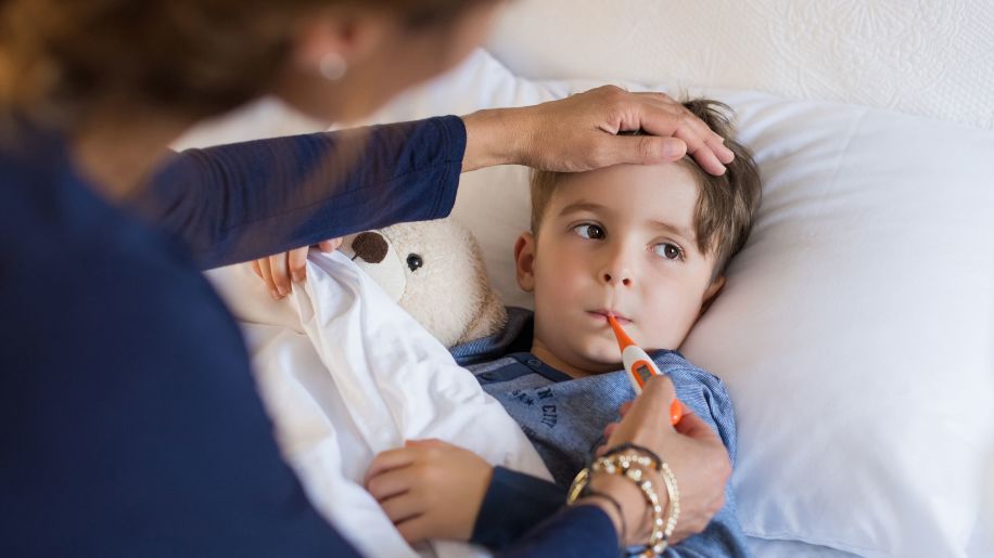 sick child, thermometer, checking temperature, bed