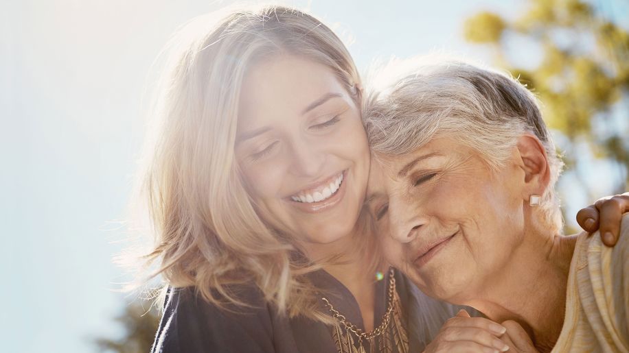 Senior mother and daughter hugging