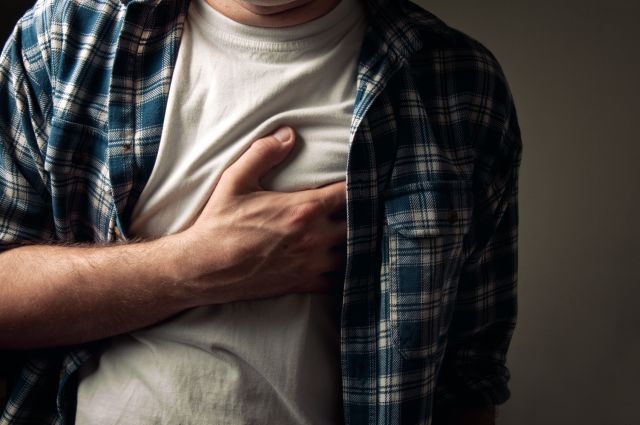 someone with heartburn