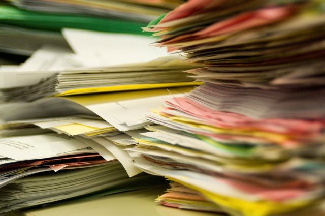 Stacks of paper ready to be filed.