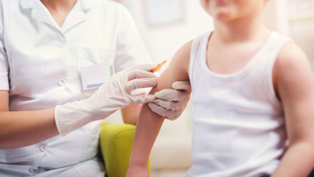 nurse, boy, vaccine, shot, boy getting a shot in the arm, needle