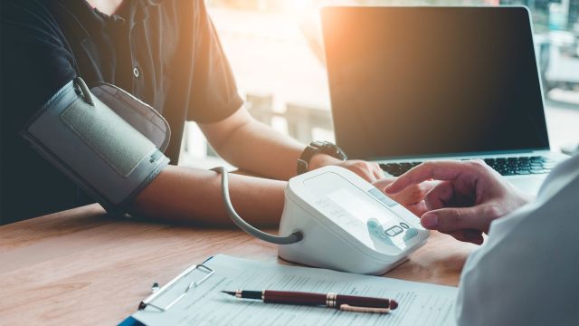 Doctor measuring a patient's blood pressure