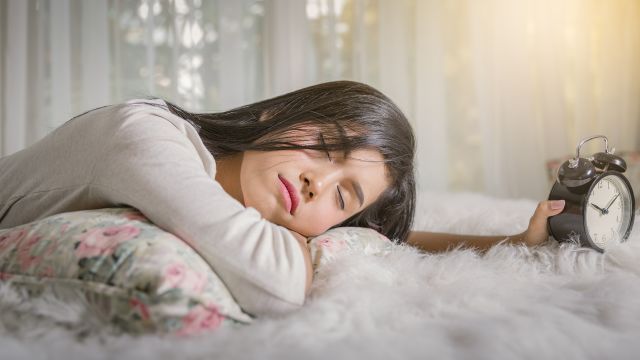 woman sleeping on stomach