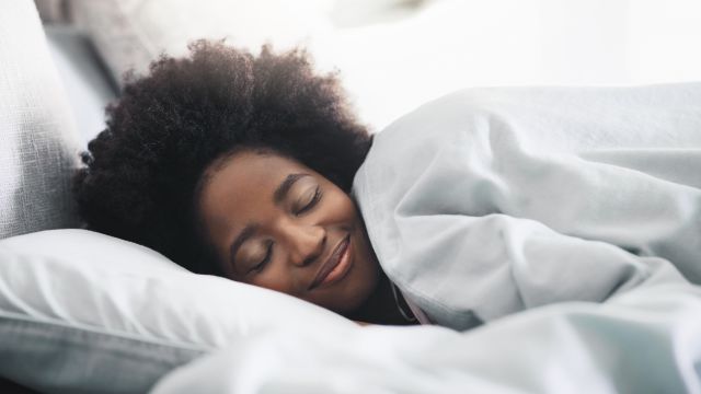 woman sleeping in bed