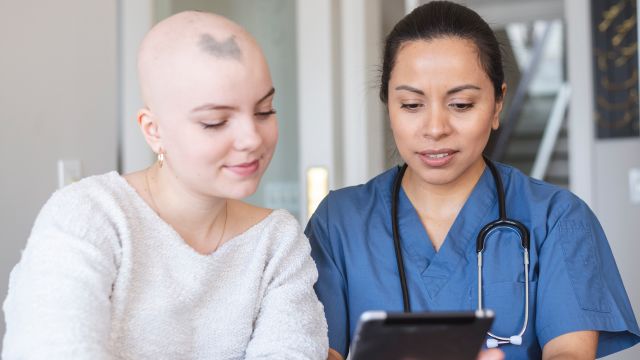 nurse talking to patient