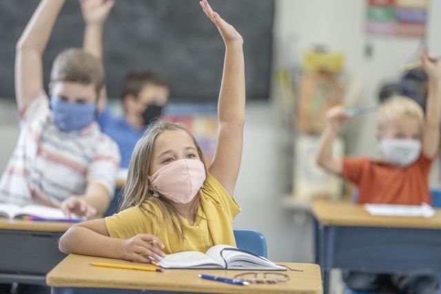 students in masks in classroom