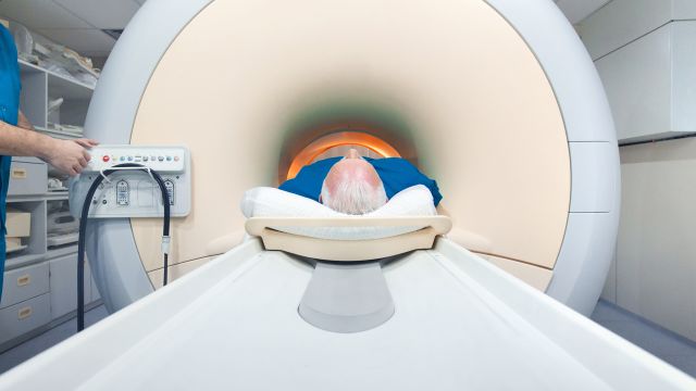 A man receives a scan for lung cancer.