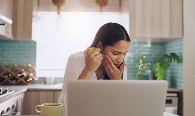 woman with tooth pain