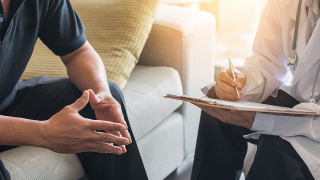 Man talking to healthcare provider