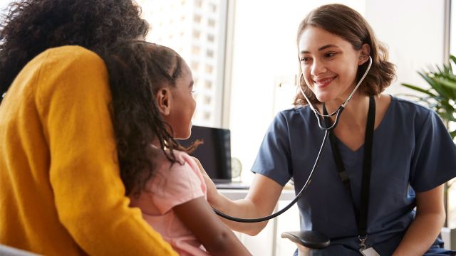 Little girl and mother at the physician's office