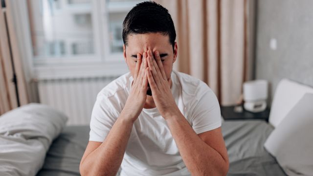 A man experiences sinus pain and discomfort. Nasal polyps are associated with a number of conditions that affect the sinuses. 