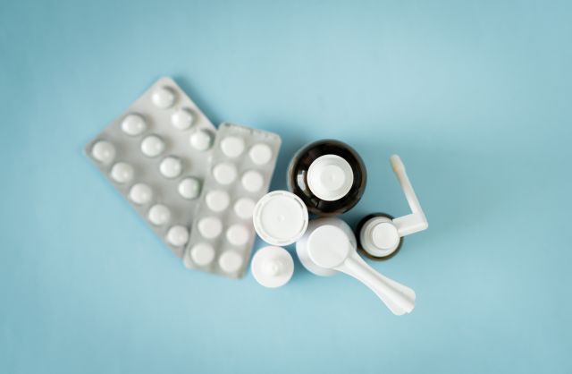 An assortment of medications used to treat dry eye, including nasal sprays, oral medications, and eye drops.