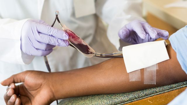 nurse taking patient's blood