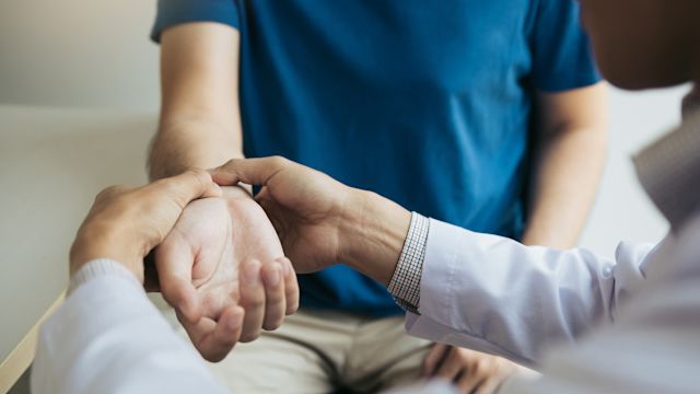 Arthritis patient with doctor