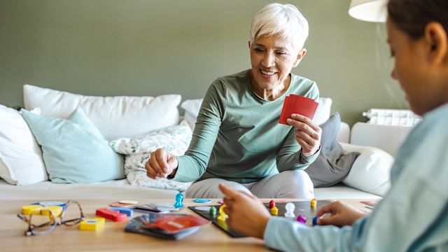 Activities like board games, card games, and building puzzles can help exercise the brain and encourage social interaction for people with Alzheimer's disease.