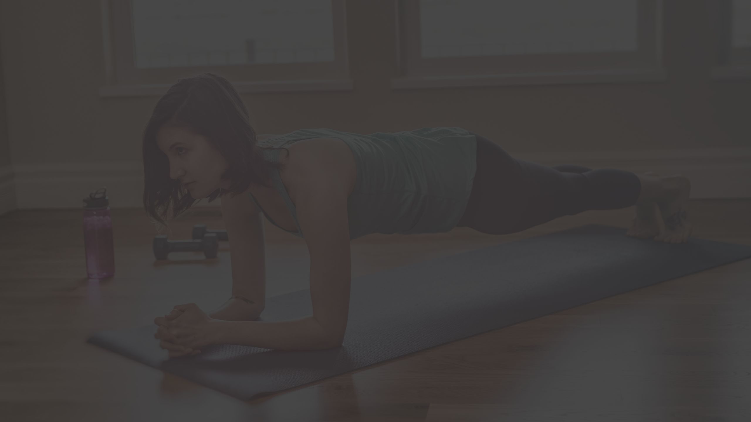 woman planking mat