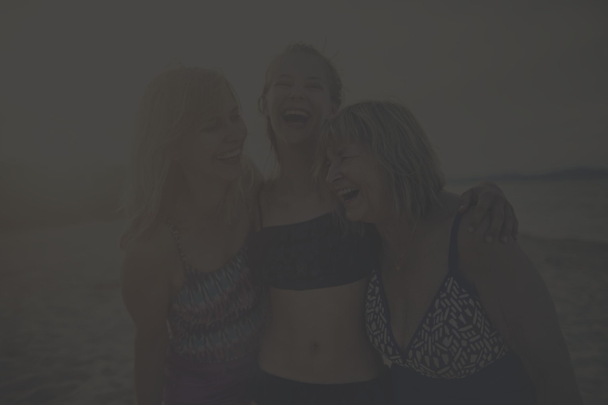 multi-generational women family at beach