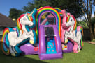 Unicorn bounce house rental entrance