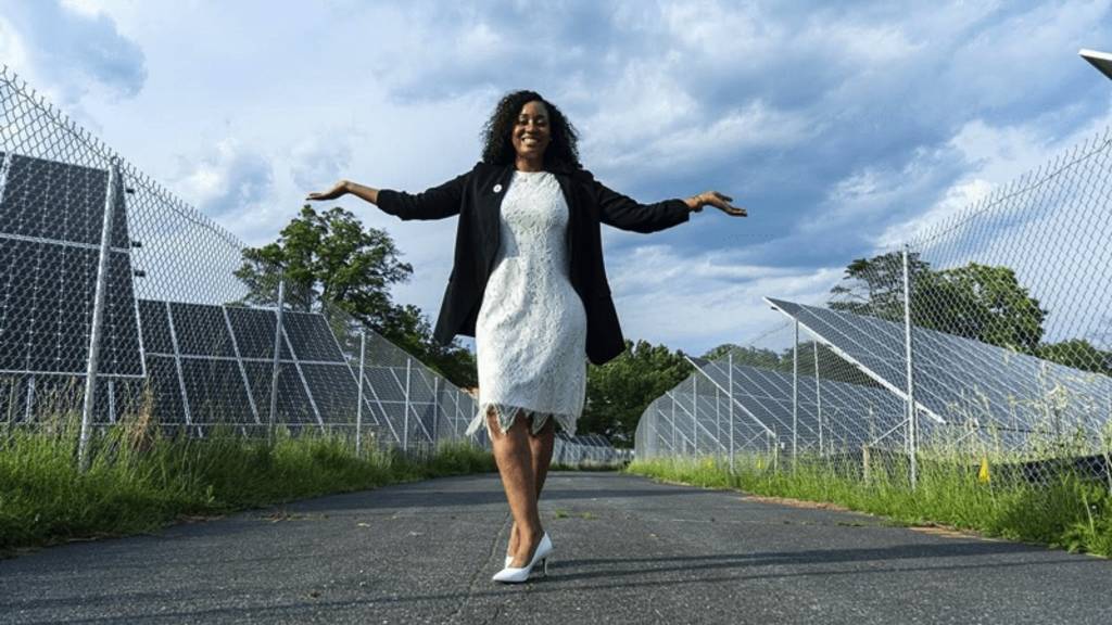 Kristal Hansley, CEO of WeSolar, at a solar farm.