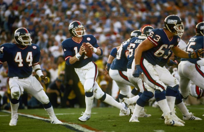 Ranking the QB matchup of every Super Bowl - NewsOpener Super Bowl XXI: Phil Simms, New York Giants, and John Elway, Denver Broncos